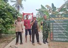 Koramil 0602-15/Baros Pasang Imbauan Keselamatan Penggunaan Jembatan Perintis Garuda di Kampung Mayak